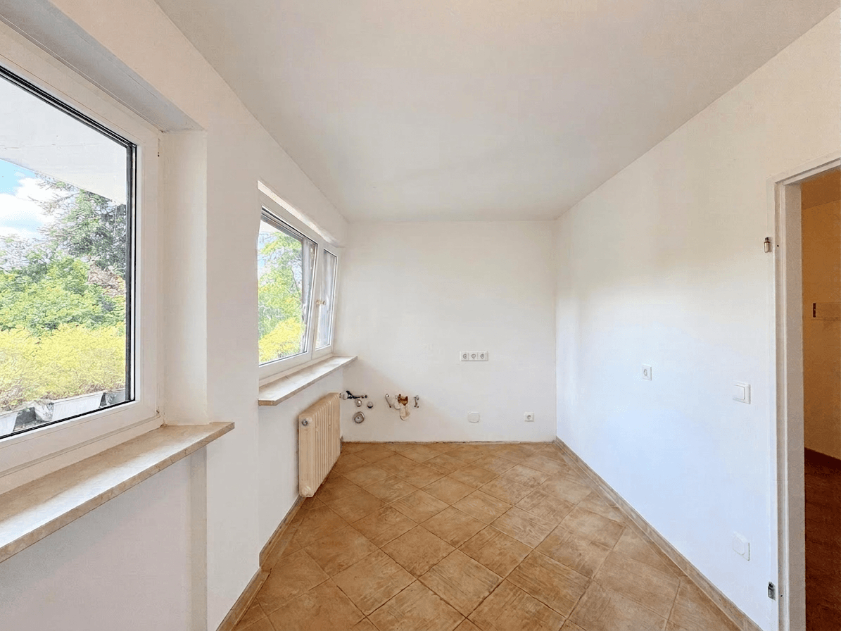 Ruheoase im Zentrum von Planegg – 3 Zimmer mit Balkon